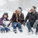 Family Ski trip to Austria, family in the snow.